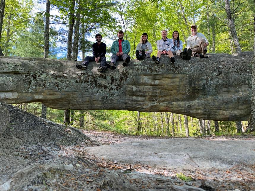 Stratigraphy Lab taking a break on Log Rock, a natural rock arch in the Pennsylvanian Breathitt Group of Kingdom Come State Park in eastern Kentucky. 
